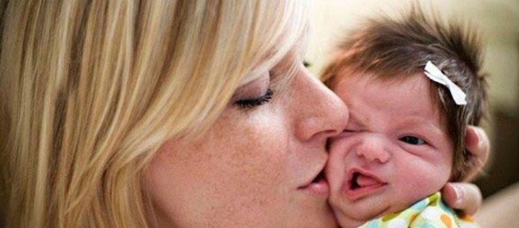 Mom-Kissing-Baby-Funny-Picture